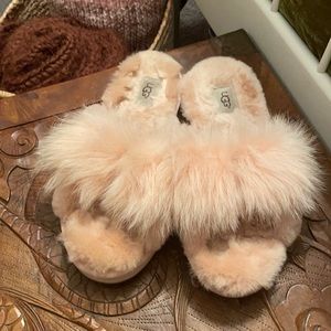 Pink fluffy ugg slippers